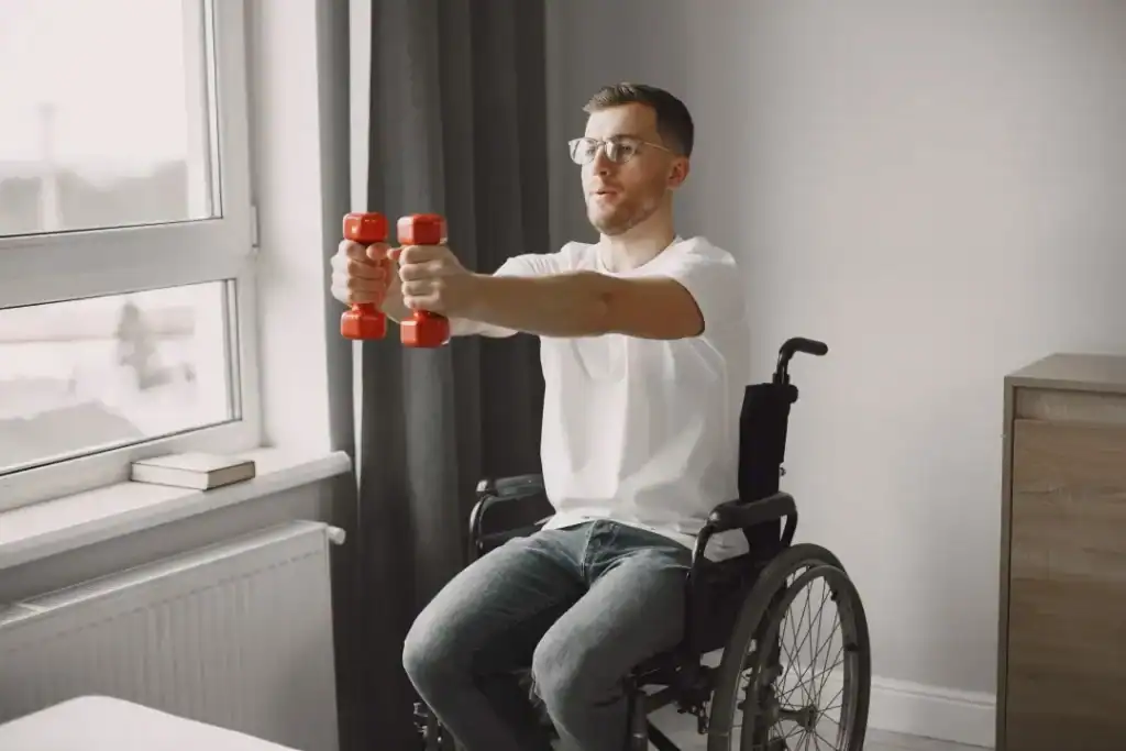 Empowering Weight Loss: A Comprehensive Guide for Individuals with Disabilities 1 Image of man doing exercise in his wheelchair to aid weight loss Stratford-upon-Avon
