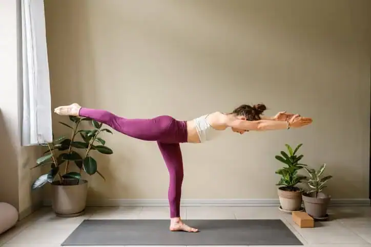 Achieving the Perfect Tone: How Often Should You Exercise for Results? 1 Woman doing Yoga exercise Stratford-upon-Avon to help with toning the body.