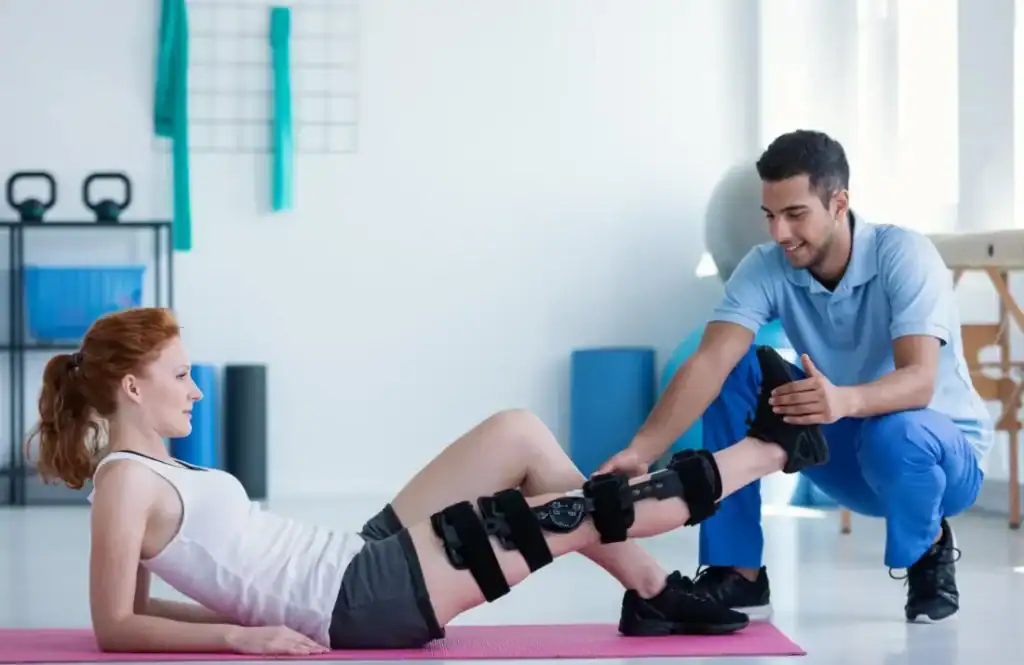 Debunking Meal Timing Myths: The Truth About Muscle Recovery 1 Woman having treatment to help muscle recovery Stratford-upon-Avon after an injury
