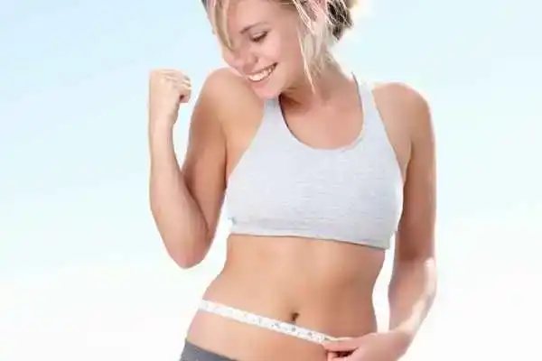 Unraveling the Mystery: Where Does the Body Fat Loss From First? 3 Image of woman happy with fat loss Stratford-upon-Avon